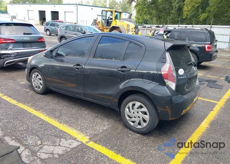 2015 Toyota Prius C One from USA, damaged, VIN JTDKDTB38F1113574
